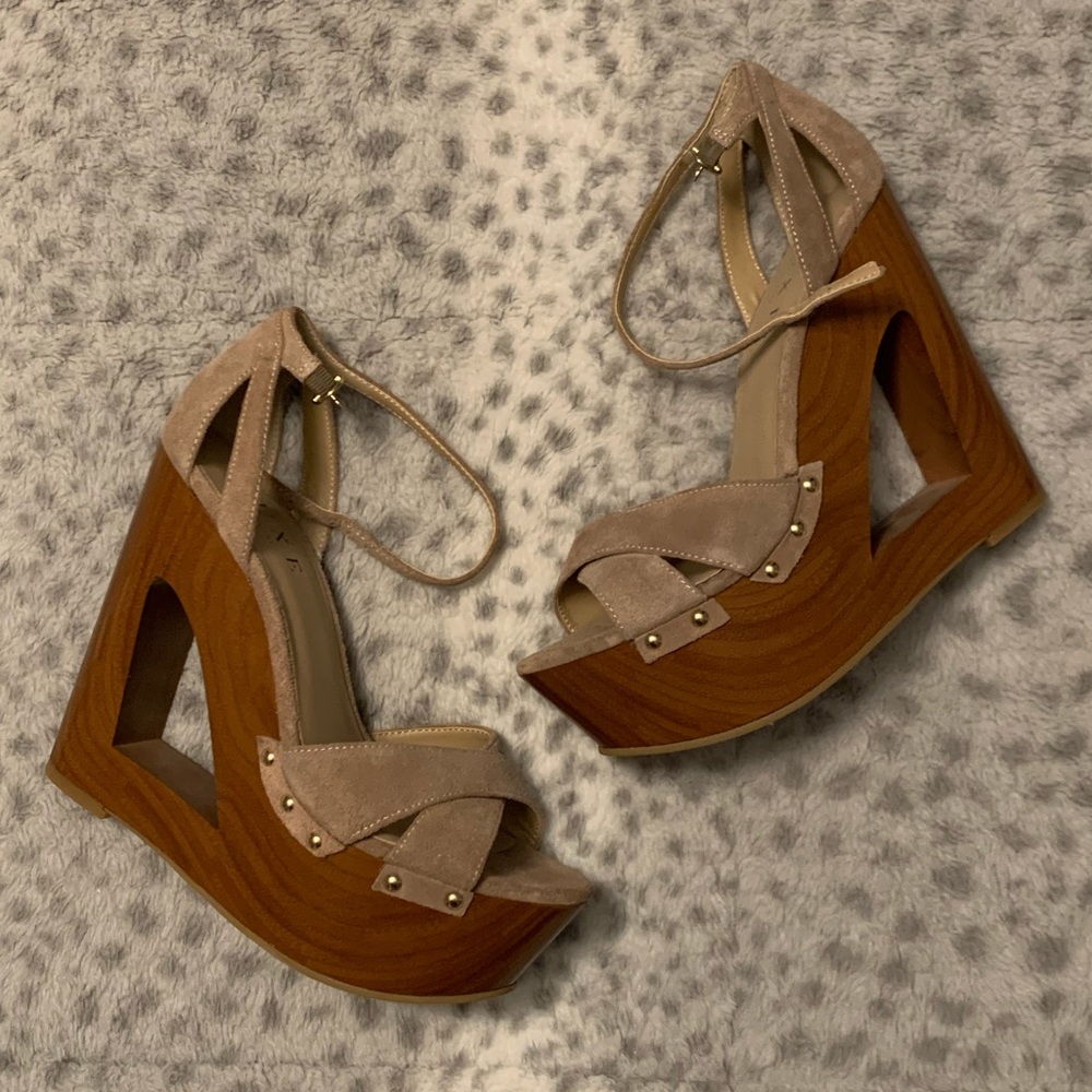New suede wedge wood like heel.
